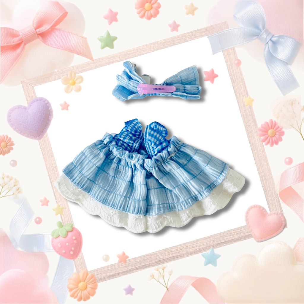 The back view of the clothing set that include baby blue ribbon dress and oversized headband bow.