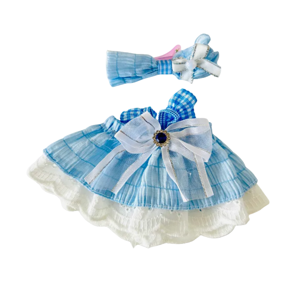A Labubu dress set clothing top view, a baby blue and white dress with ruffle and matching headband. 