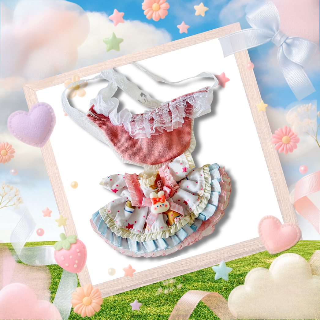 The back view of the clothing set that include pale blue and pink lolita dress with a bonnet.