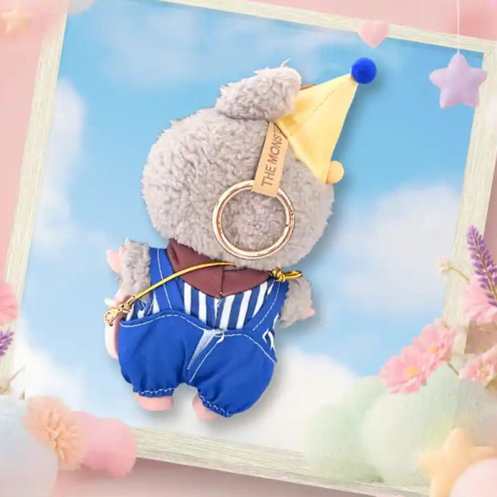 A back view Labubu wearing a clothing set of blue striped overalls and rainbow cone hat
