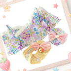 The front view of the clothing set that include purple floral kimono and tulle hairpiece.