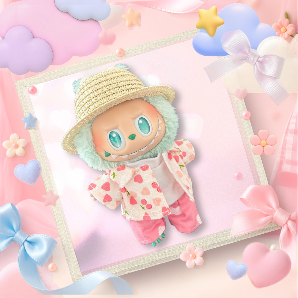 A front view Labubu wearing a clothing set of strawberry shirt, trousers, and straw hat