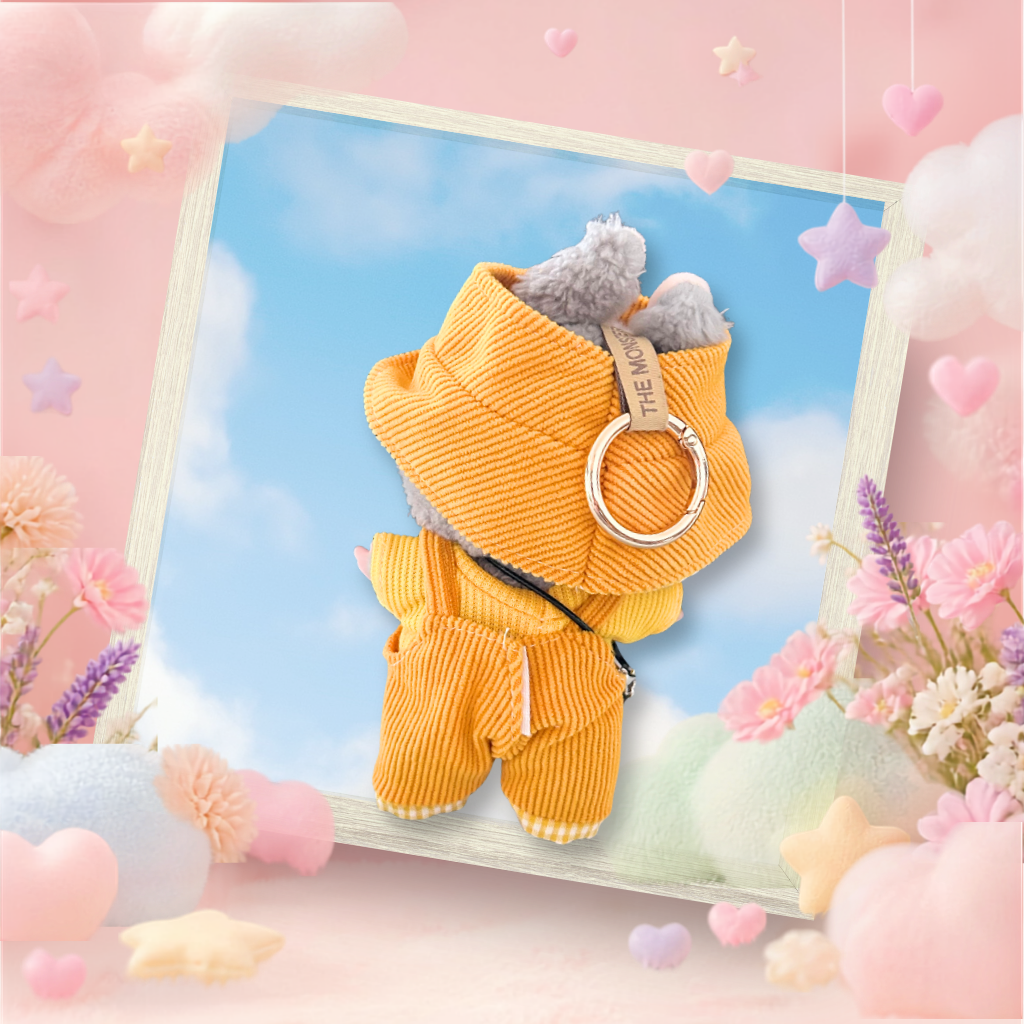 A back view of the clothing set of yellow corduroy overalls and gingham bucket hat