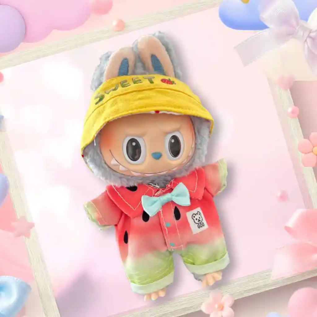 A front view Labubu wearing a clothing set of green watermelon romper and embroidered bucket hat