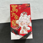 A red and black blind box with gold Chinese characters and the text 'HAVE A GOOD RUN' . 