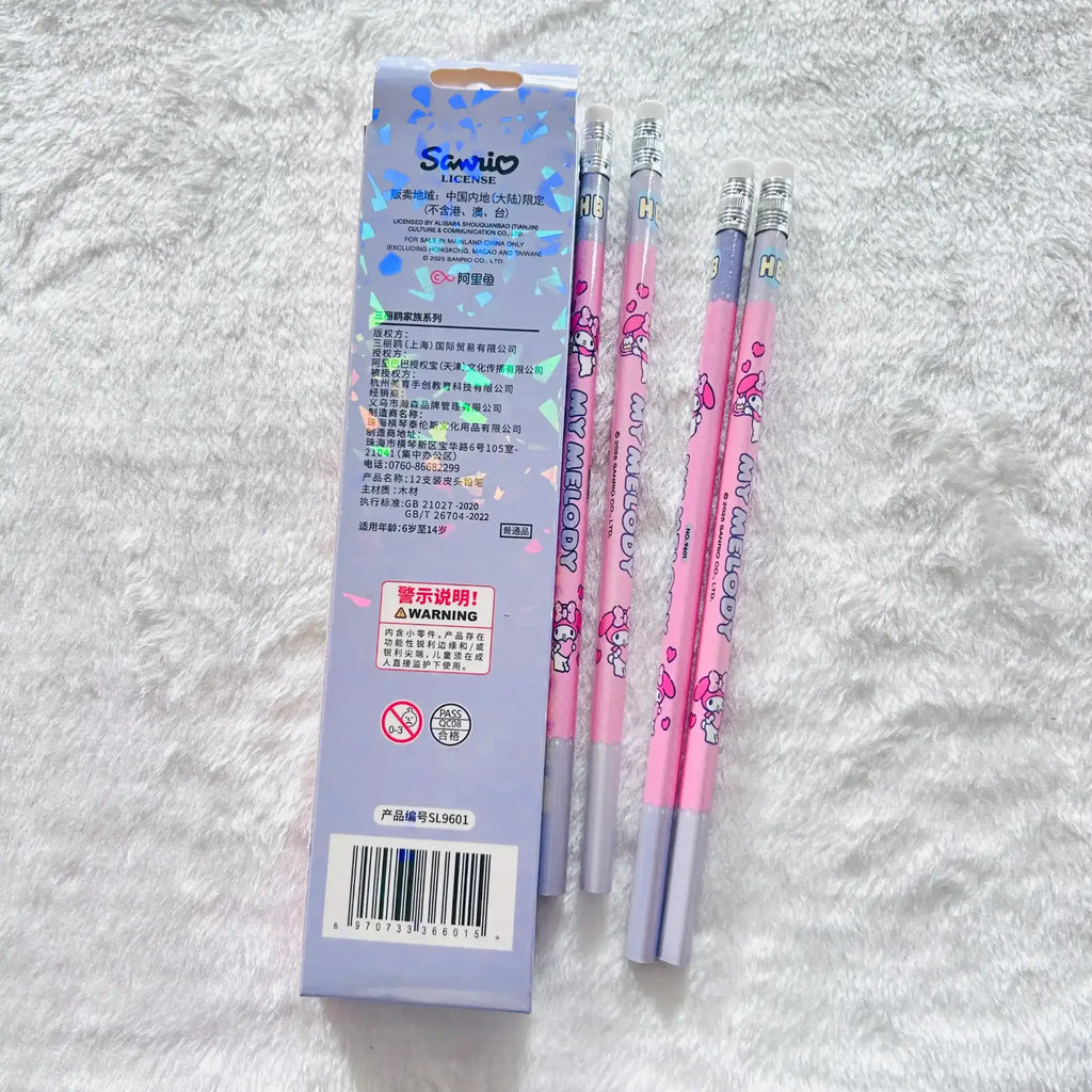 Three pink and silver Starion brand mechanical pencils with cartoon graphics are displayed next to their light purple packaging box.