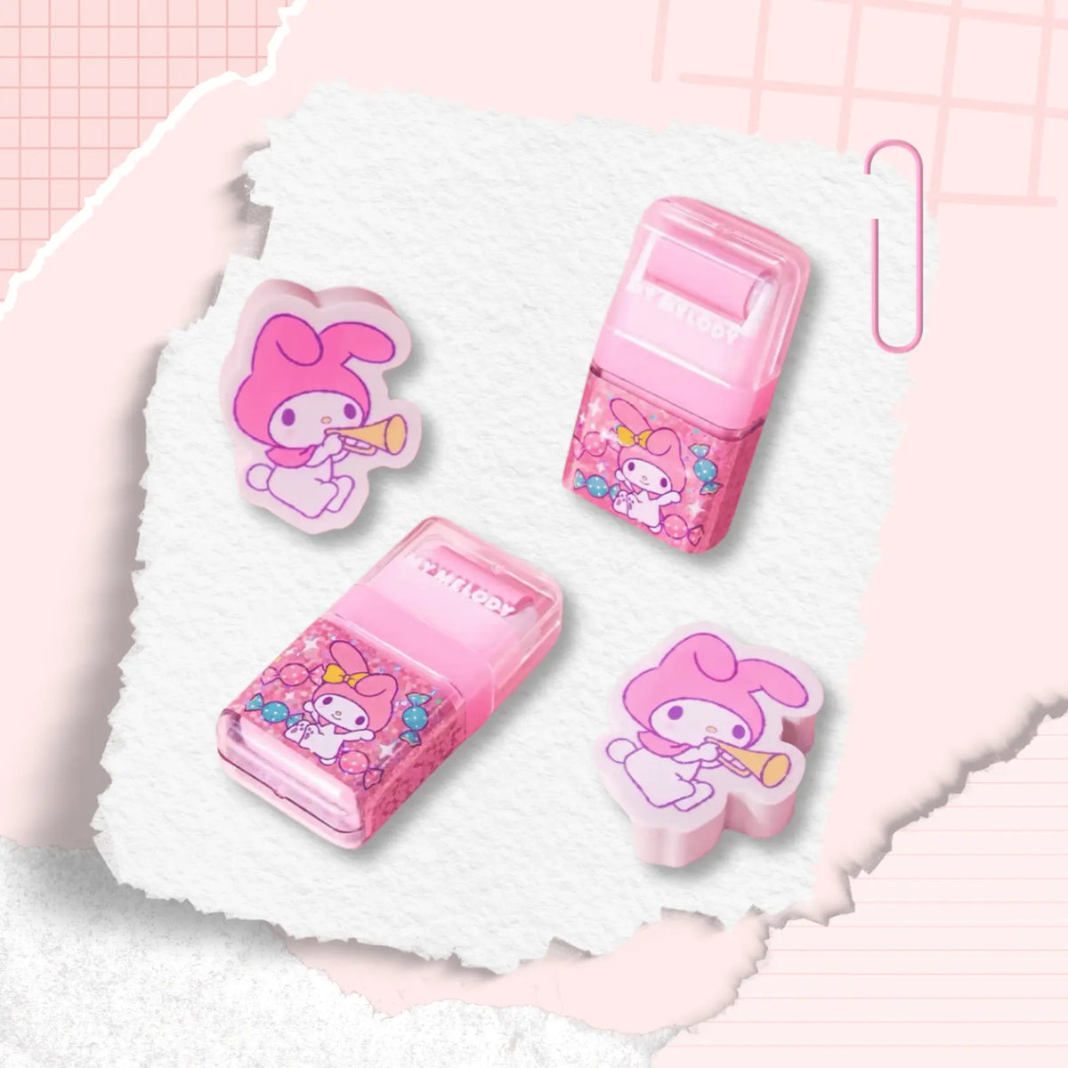 A few pink My Melody-themed erasers, two translucent pink plastic cases and two character-shaped pieces featuring My Melody illustrations.