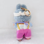 Back view of a Labubu plush doll wearing a white top and pink overalls.